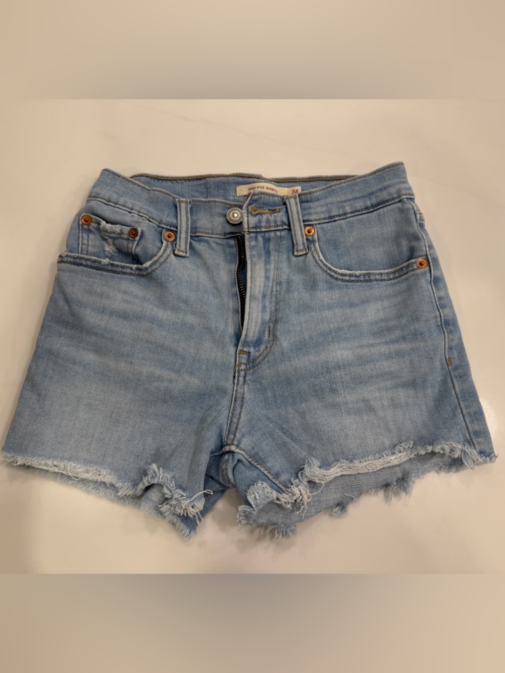 Women’s Levi’s Light Wash High Rise Denim Cutoff Shorts - Light Blue. Size 24
